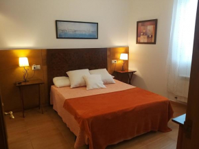 Apartamento con pequeño jardín en el centro